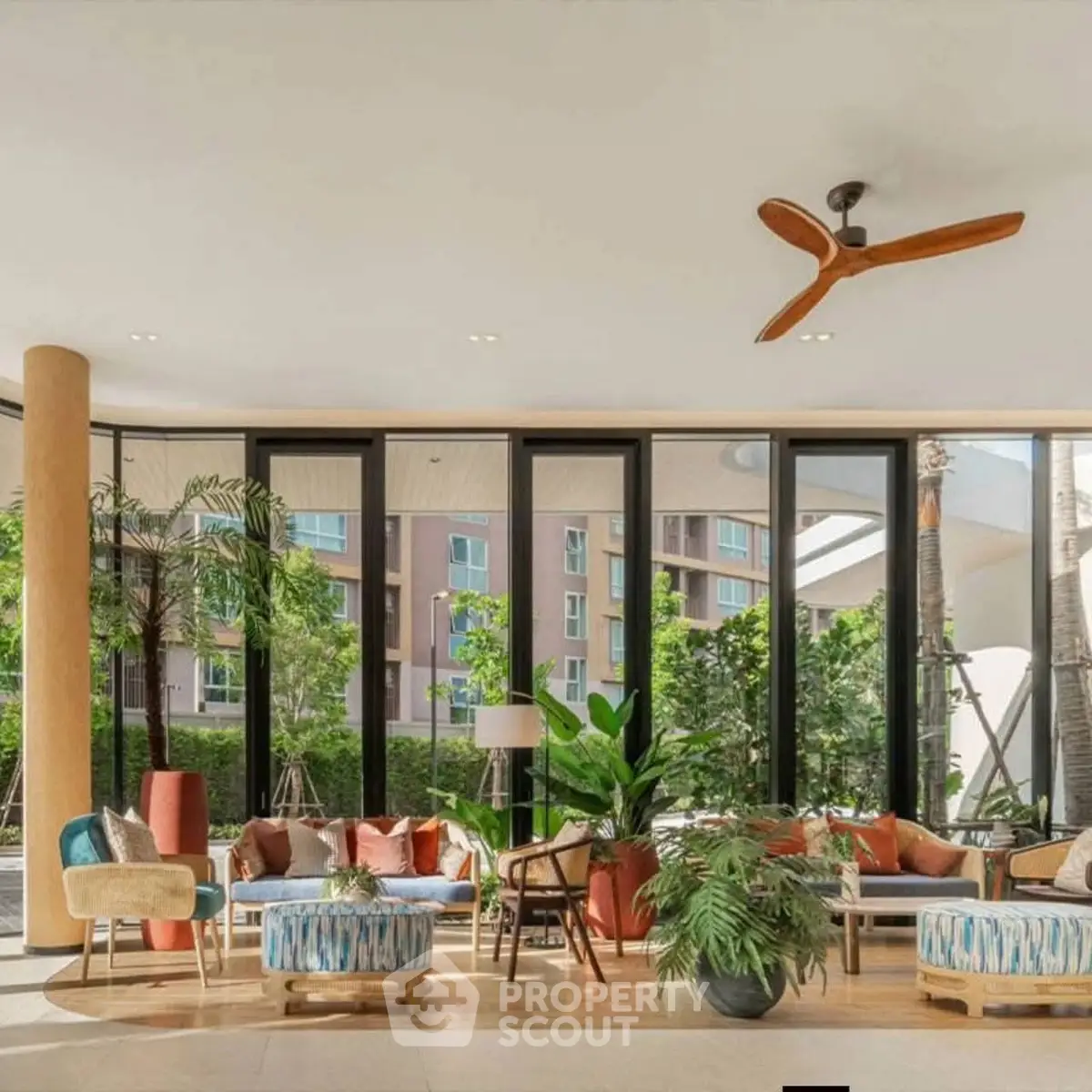 Luxurious modern living room with large windows and stylish decor in a high-end apartment complex.