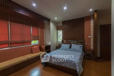 Cozy bedroom with modern decor and natural light