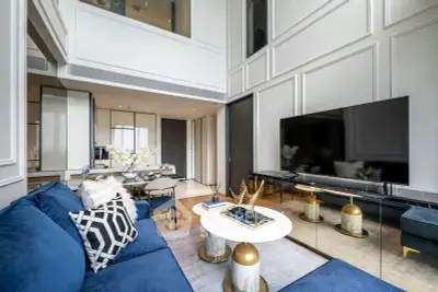 Luxurious modern living room with high ceilings and elegant decor