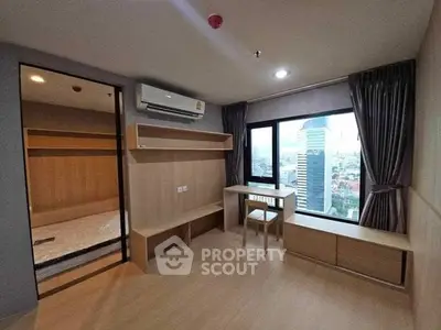 Modern study room with city view, wooden furniture, and ample natural light.