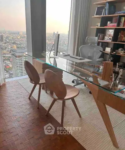 Modern study room with glass desk and city view, featuring stylish chairs and wooden flooring.