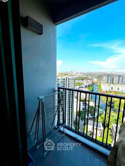 Stunning high-rise balcony with panoramic city views, perfect for urban living enthusiasts.