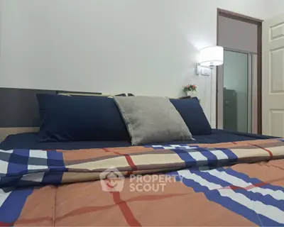 Cozy bedroom with modern decor and stylish bedding