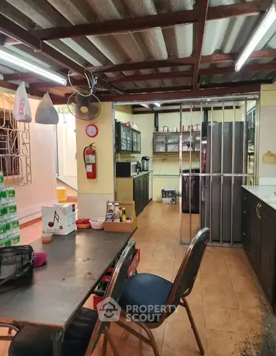 Spacious kitchen with open layout and modern appliances