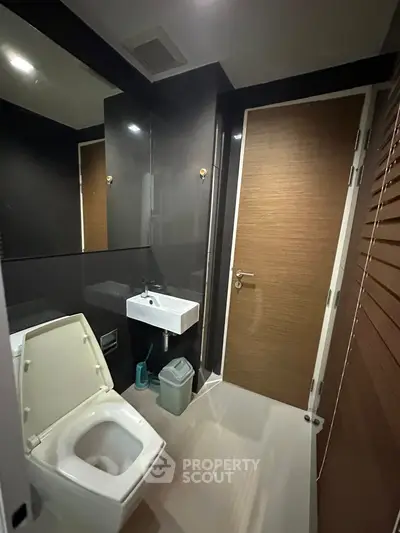 Modern bathroom with sleek design and compact layout
