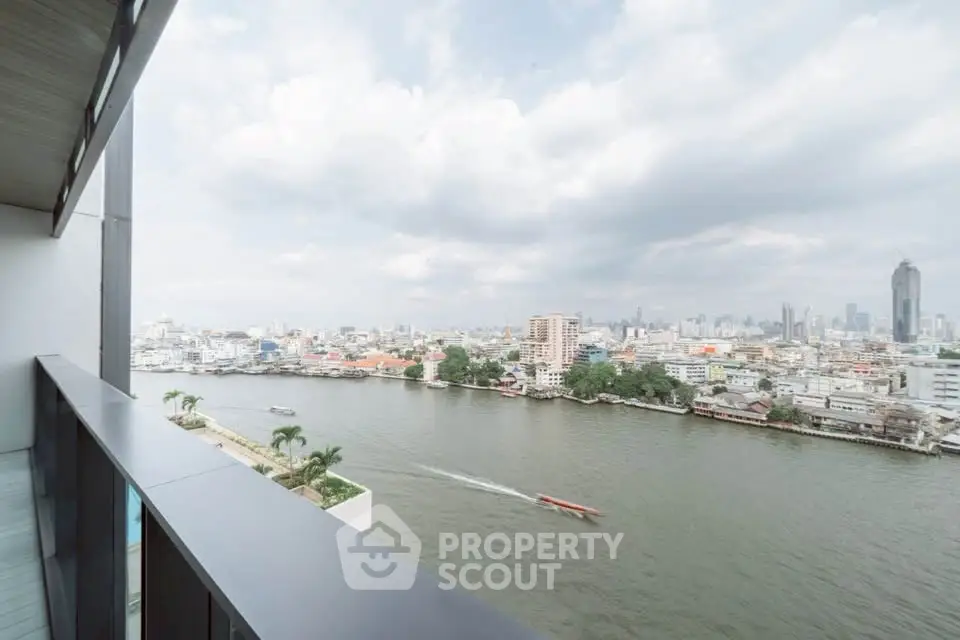 Stunning river view from high-rise balcony in urban cityscape
