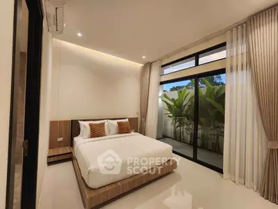 Luxurious bedroom with modern design and private balcony access
