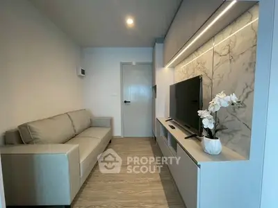 Modern living room with sleek design and marble accent wall