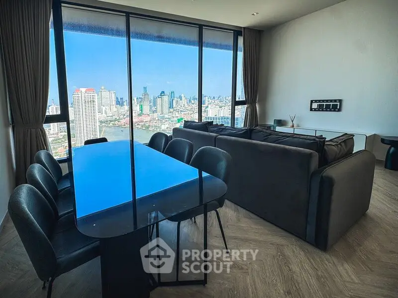 Stunning living room with panoramic city view and modern furnishings
