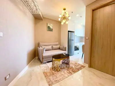 Modern living room with elegant decor and stylish lighting in a luxury apartment.