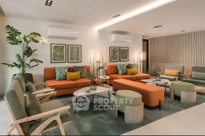Stylish modern living room with vibrant decor and cozy seating area.