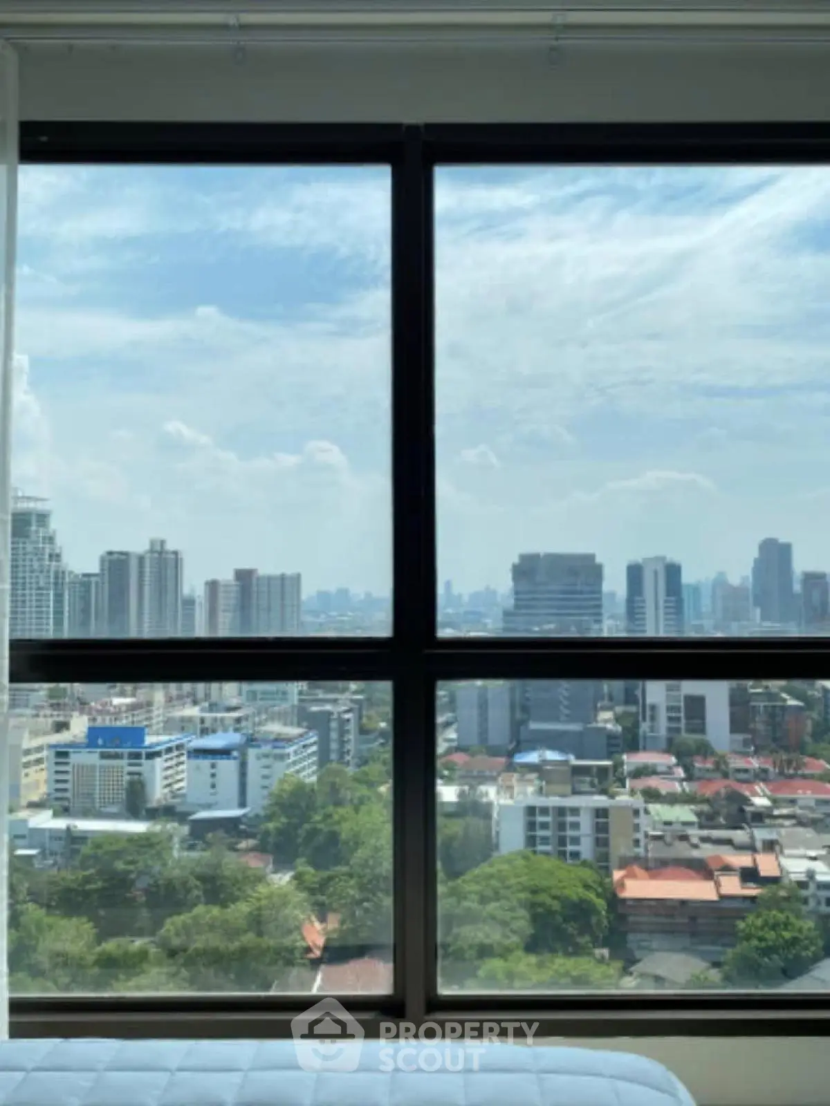 Stunning cityscape view from high-rise apartment window