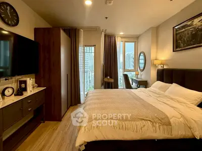 Luxurious bedroom with city view, stylish decor, and modern amenities for ultimate comfort.