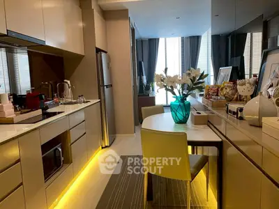 Modern kitchen with sleek cabinets and ambient lighting