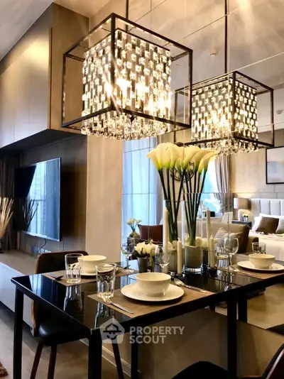Luxurious modern dining area with elegant lighting and stylish decor in a contemporary apartment.