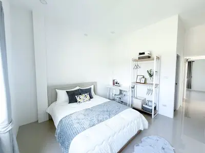Bright and airy bedroom with modern decor and cozy ambiance