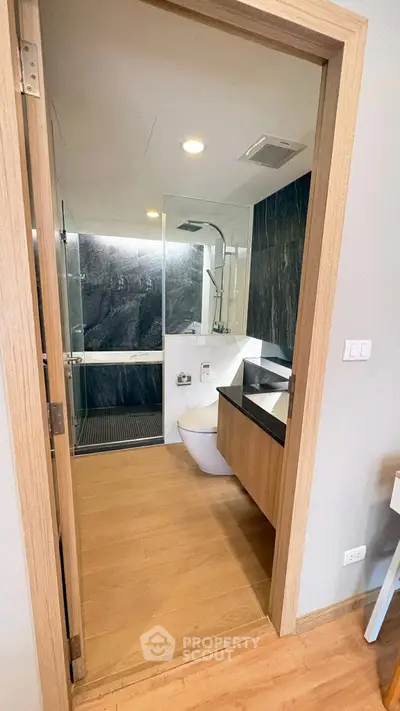 Modern bathroom with sleek design and glass shower enclosure