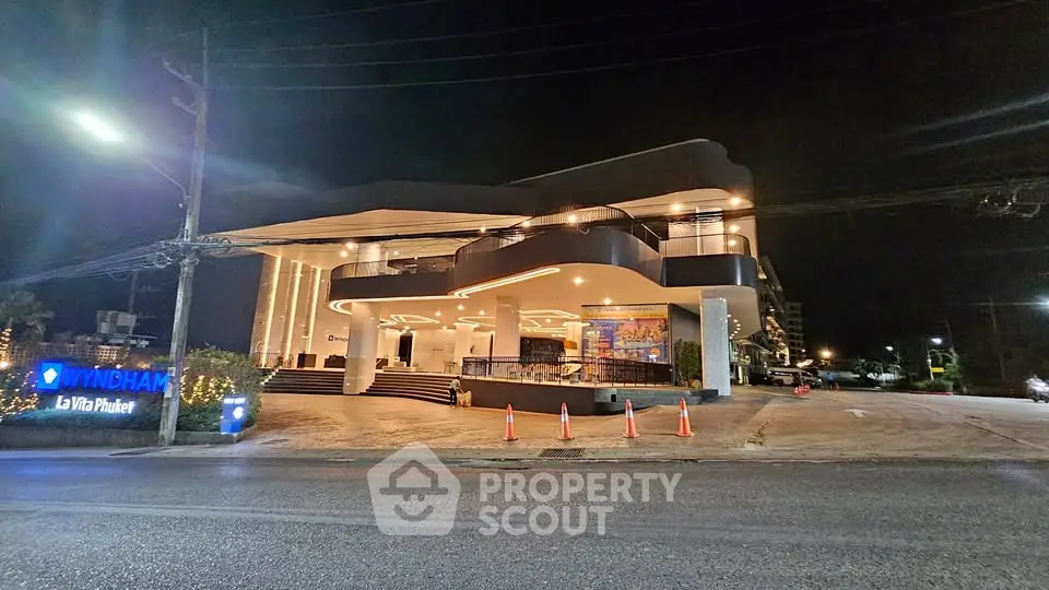 Stunning night view of Wyndham La Vita Phuket's modern exterior architecture.