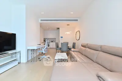 Modern open-plan living room with sleek furniture and stylish decor