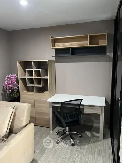 Modern study room with sleek desk, ergonomic chair, and stylish shelving