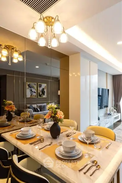 Elegant dining area with modern decor and stylish lighting in a luxurious apartment.