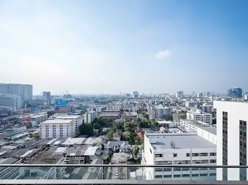 Stunning cityscape view from a high-rise balcony, perfect for urban living.