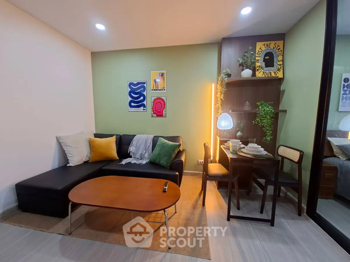 Modern living room with stylish decor and cozy dining area, perfect for urban living.