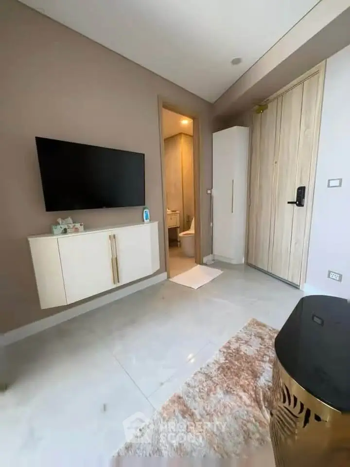 Modern living room with sleek TV setup and stylish decor
