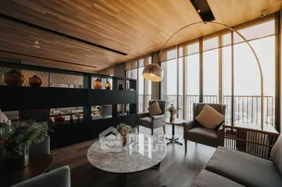 Luxurious modern living room with elegant decor and panoramic city views.