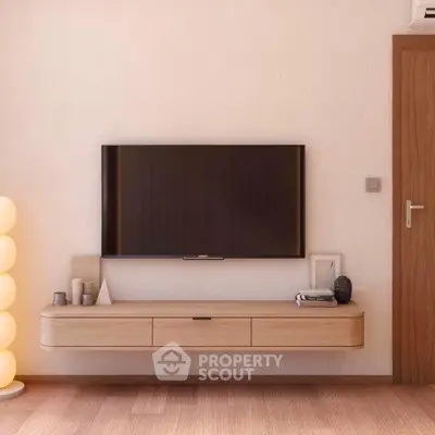 Modern living room with wall-mounted TV and stylish wooden console