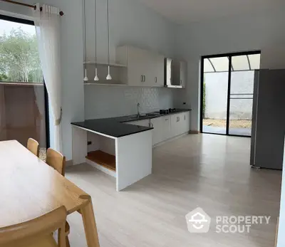 Spacious modern kitchen with open layout and sleek design