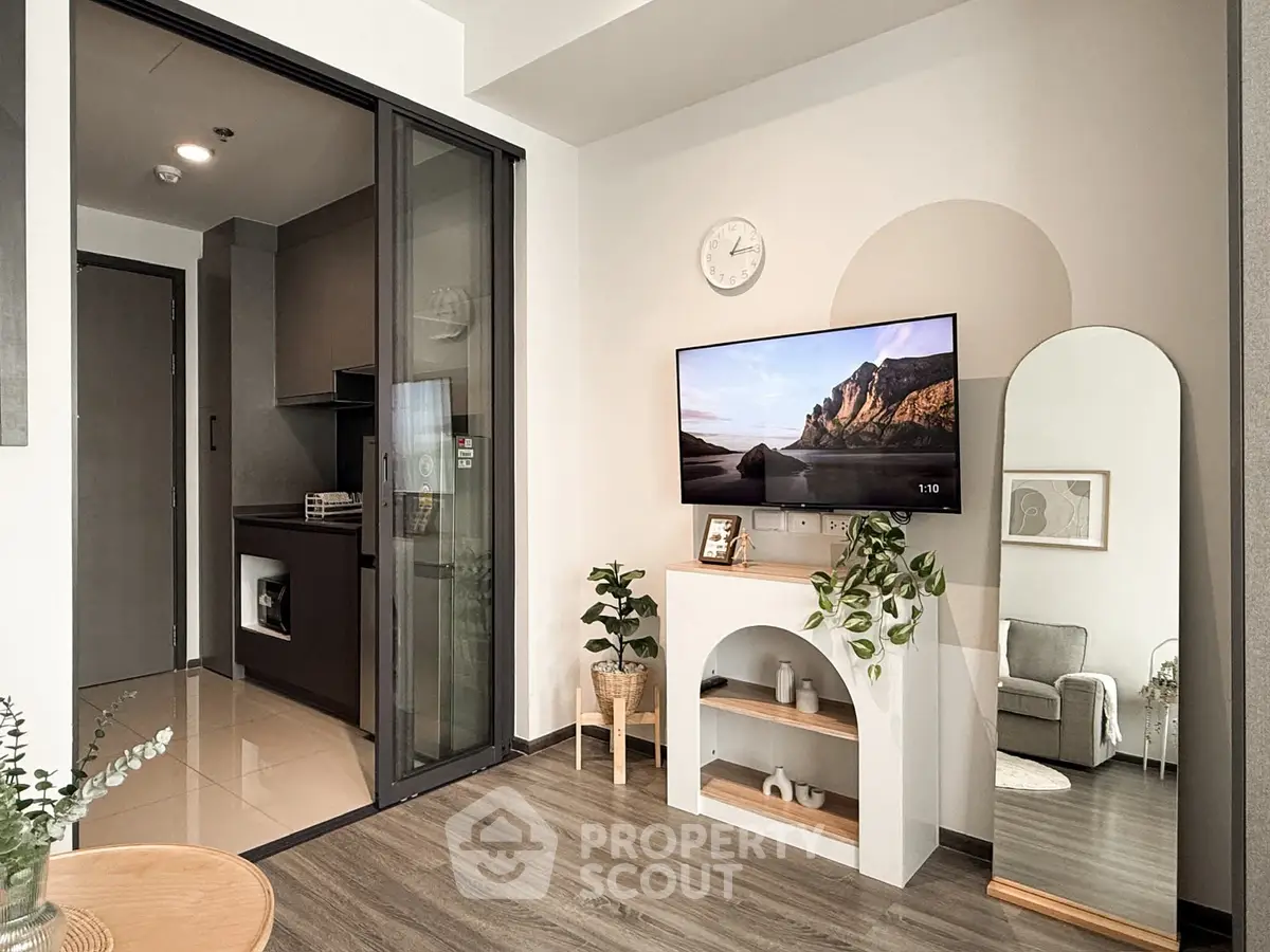 Modern living room with stylish decor and open kitchen layout