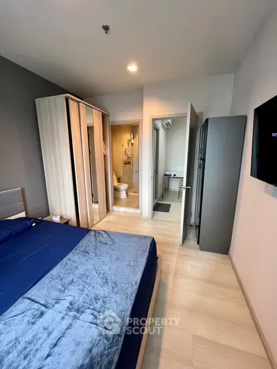 Modern bedroom with ensuite bathroom and sleek design