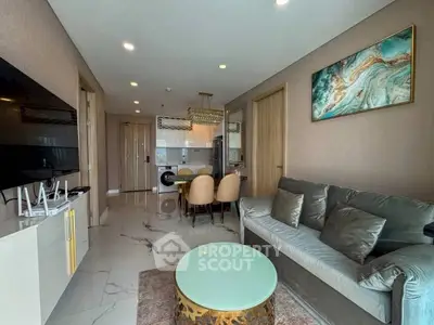 Luxurious modern living room with elegant decor and open kitchen layout