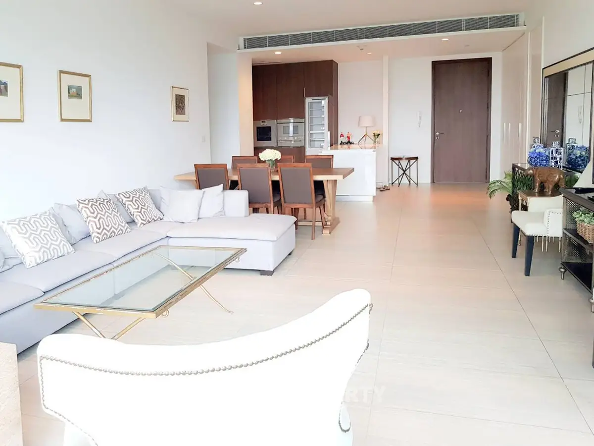 Spacious modern living room with open kitchen and elegant decor