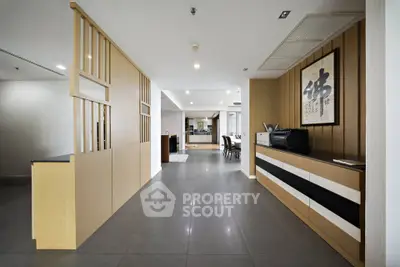 Spacious modern living area with elegant decor and open layout, perfect for stylish urban living.
