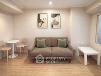 Cozy living room with modern decor and comfortable seating