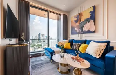 Luxurious living room with stunning city view, modern decor, and elegant furnishings.