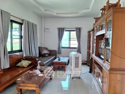 Spacious living room with wooden furniture and modern decor