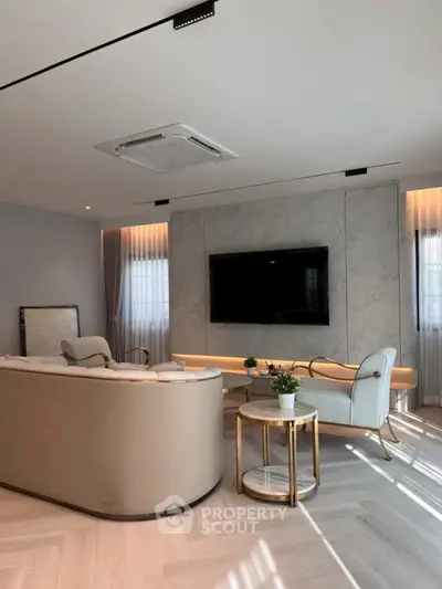 Luxurious modern living room with elegant furniture and ambient lighting