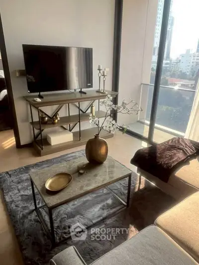 Stylish living room with modern decor and city view balcony