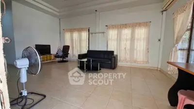 Spacious living room with modern furniture and natural light