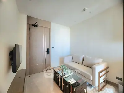 Modern living room with sleek design and cozy sofa