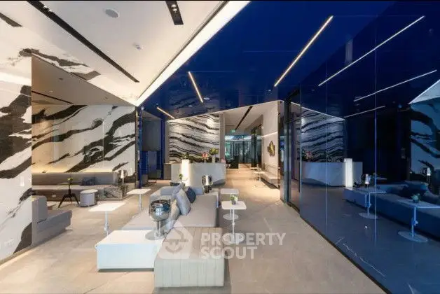 Luxurious modern living room with elegant lighting and spacious design