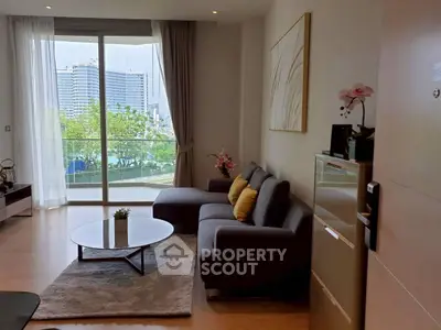 Modern living room with large windows and stylish decor