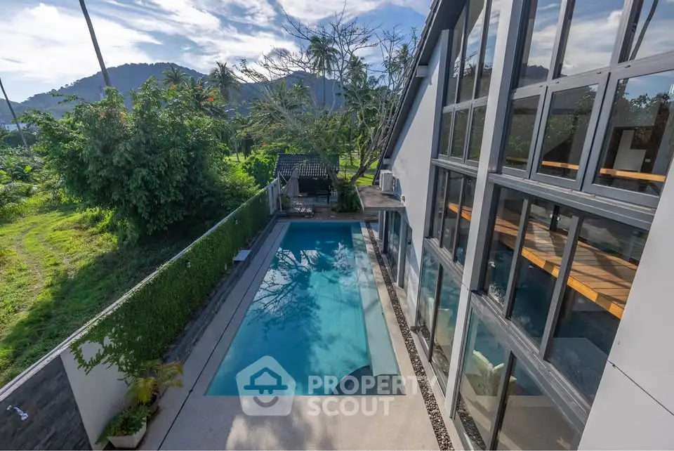 Stunning modern villa with private pool and lush garden view