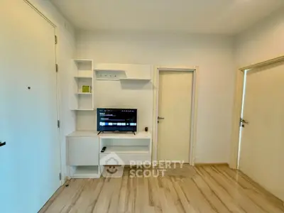 Modern living room with sleek TV setup and minimalist decor