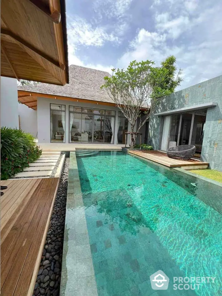 Luxurious villa with private pool and modern architecture, perfect for relaxation and leisure.