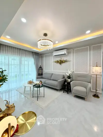 Luxurious living room with elegant decor, modern furniture, and ambient lighting for a sophisticated lifestyle.