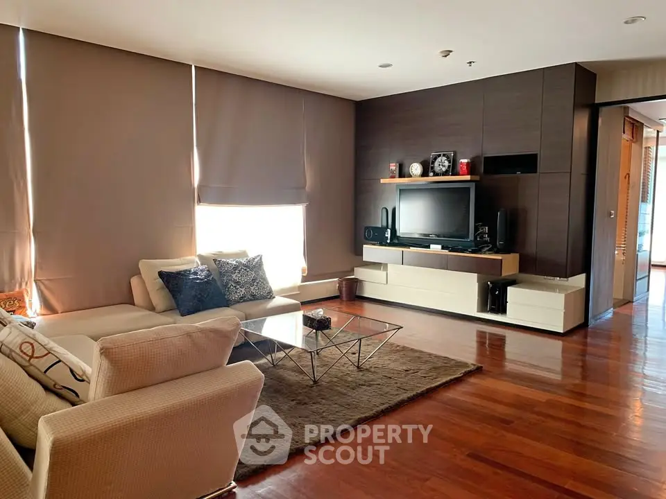 Spacious modern living room with elegant decor and hardwood floors